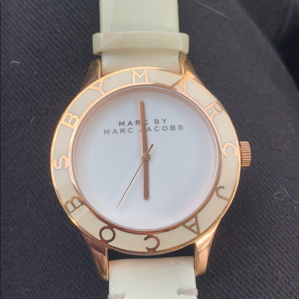 Marc Jacobs rose gold, white leather watch.